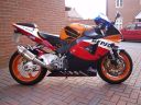 Honda_954_Fireblade_A16_Stubby_Stainless_Exhaust_with_Slashcut_Outlet_on_Repsol_Bike.jpg