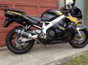 Honda_CBR900_918_1999-99_A16_Stubby_Carbon_Exhaust_with_Carbon_Cap_-_Full_Black_and_Yellow_Bike.jpeg